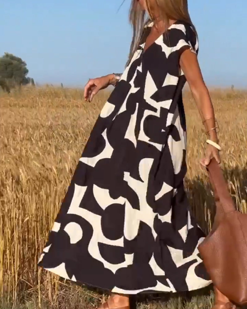 Alvina - Swobodna sukienka w abstrakcyjny wzór