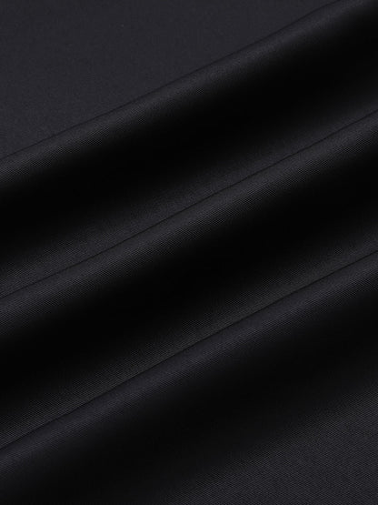 Sukienka koktajlowa pin-up z lat 50. w stylu vintage, w czarne groszki