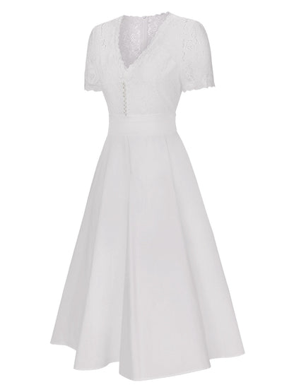 Sukienka koktajlowa rockabilly w stylu vintage z paskiem w groszki z lat 50.