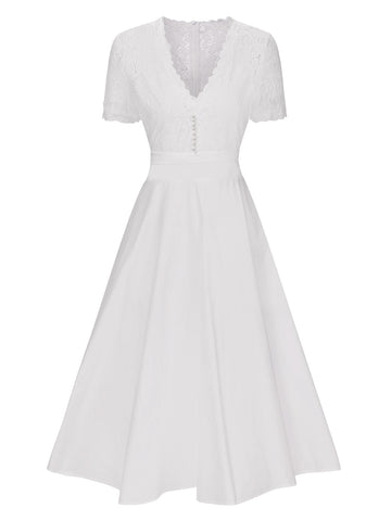 Sukienka koktajlowa rockabilly w stylu vintage z paskiem w groszki z lat 50.