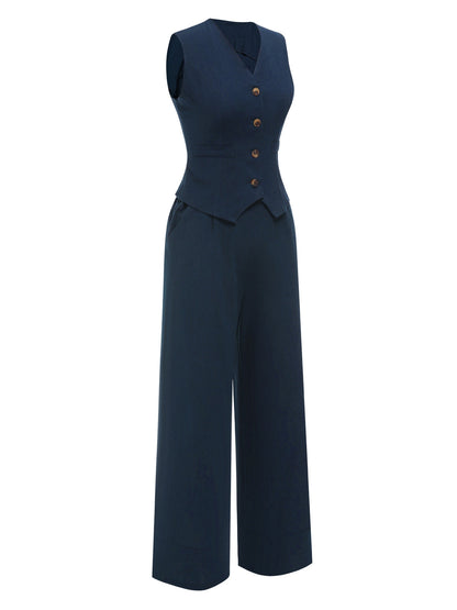 Dwuczęściowa bluzka z jednolitymi klapami i granatowa plisowana spódnica z lat 50. XX wieku