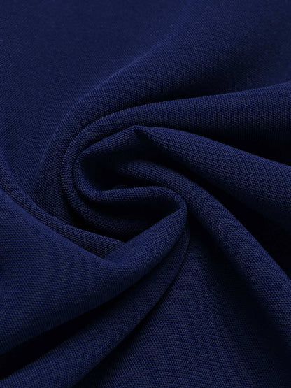 Niebieski kombinezon w paski z lat 50. z wyciętą kokardą