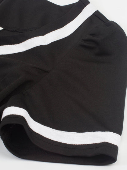 Sukienka koktajlowa vintage z halterem z lat 50., w czerwone róże z kwiatowym wzorem na imprezę