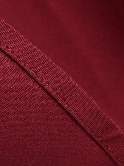 Sukienka z lat 40. w kolorze zieleni wojskowej, zapinana na guziki