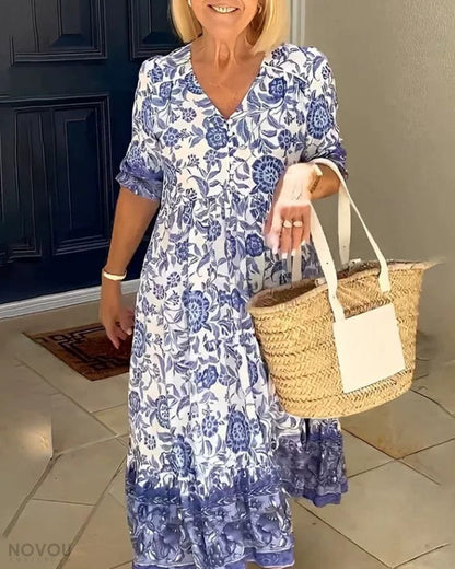 ARIA - Elegancka sukienka w kwiaty z dekoltem w serek